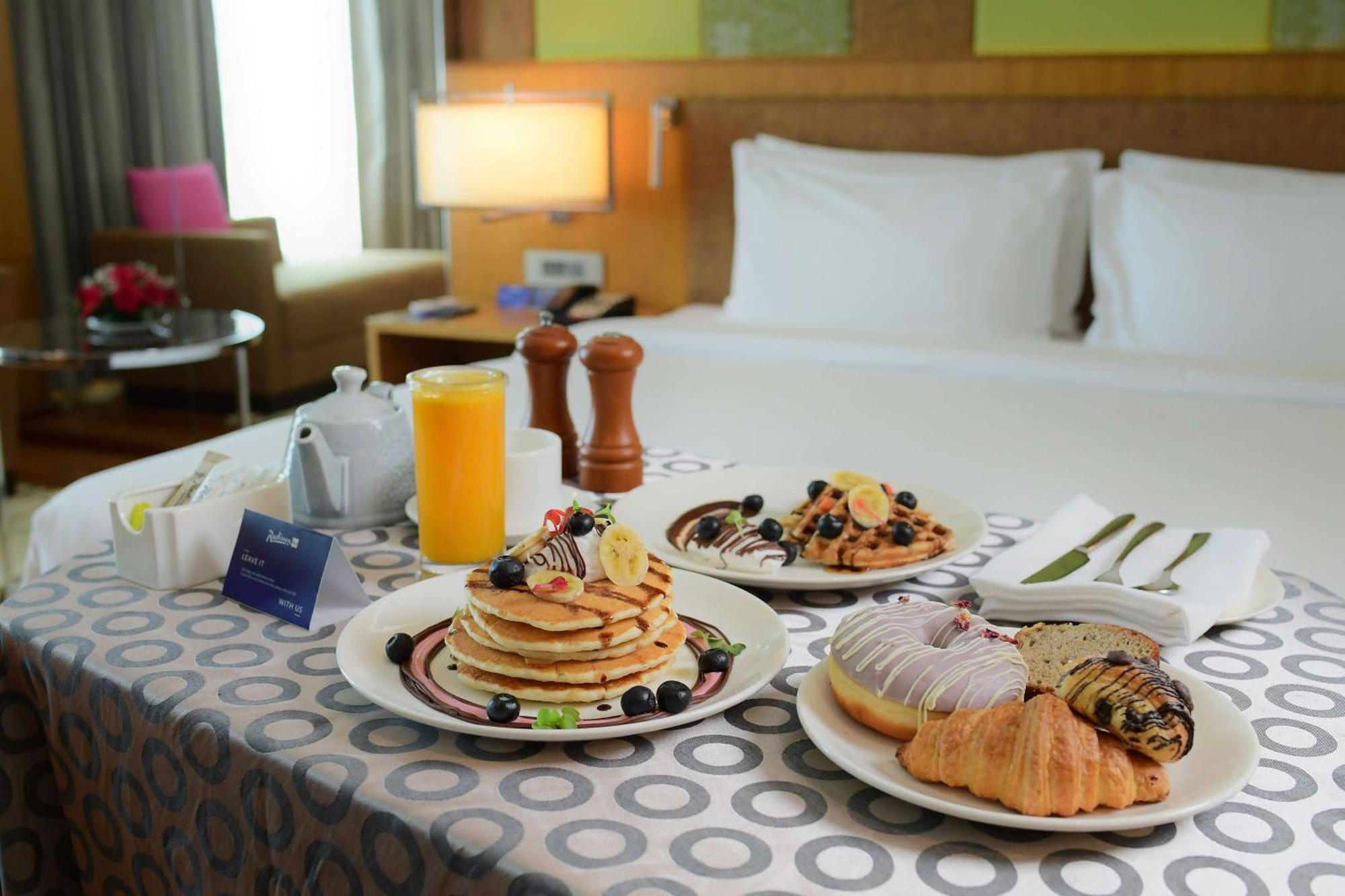 古瓦哈提丽笙酒店 外观 照片 Room service